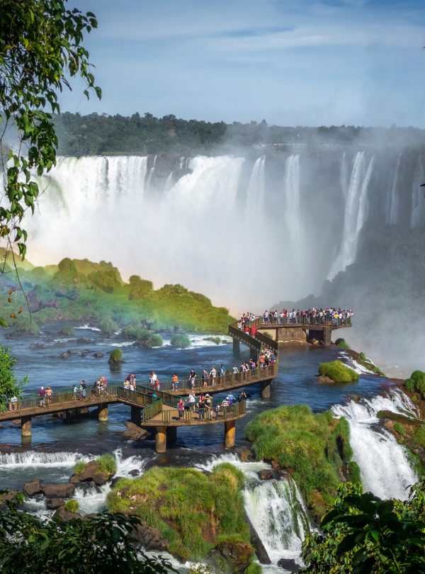 Tourists Exploring Iguazu Falls on the Border of Brazil and Argentina